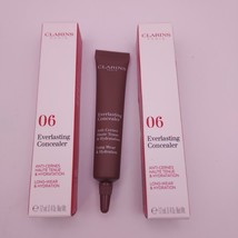 LOT OF 2 Clarins Everlasting Concealer .4oz Full Size 06 EXTRA DEEP  - $329.27 MXN