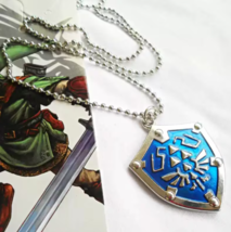  Keychain pendant, Zelda Locket Hylian Shield pendant, Anniversary gift - £18.08 GBP