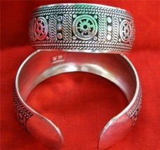 Huge Tibetan Silver carved Repetitive Dharma Wheel Arch Amulet Cuff Brac... - $9.86