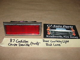 87 Cadillac Coupe Deville FWD DOOR PANEL COURTESY LIGHT RED LENS #20336973 - $49.49