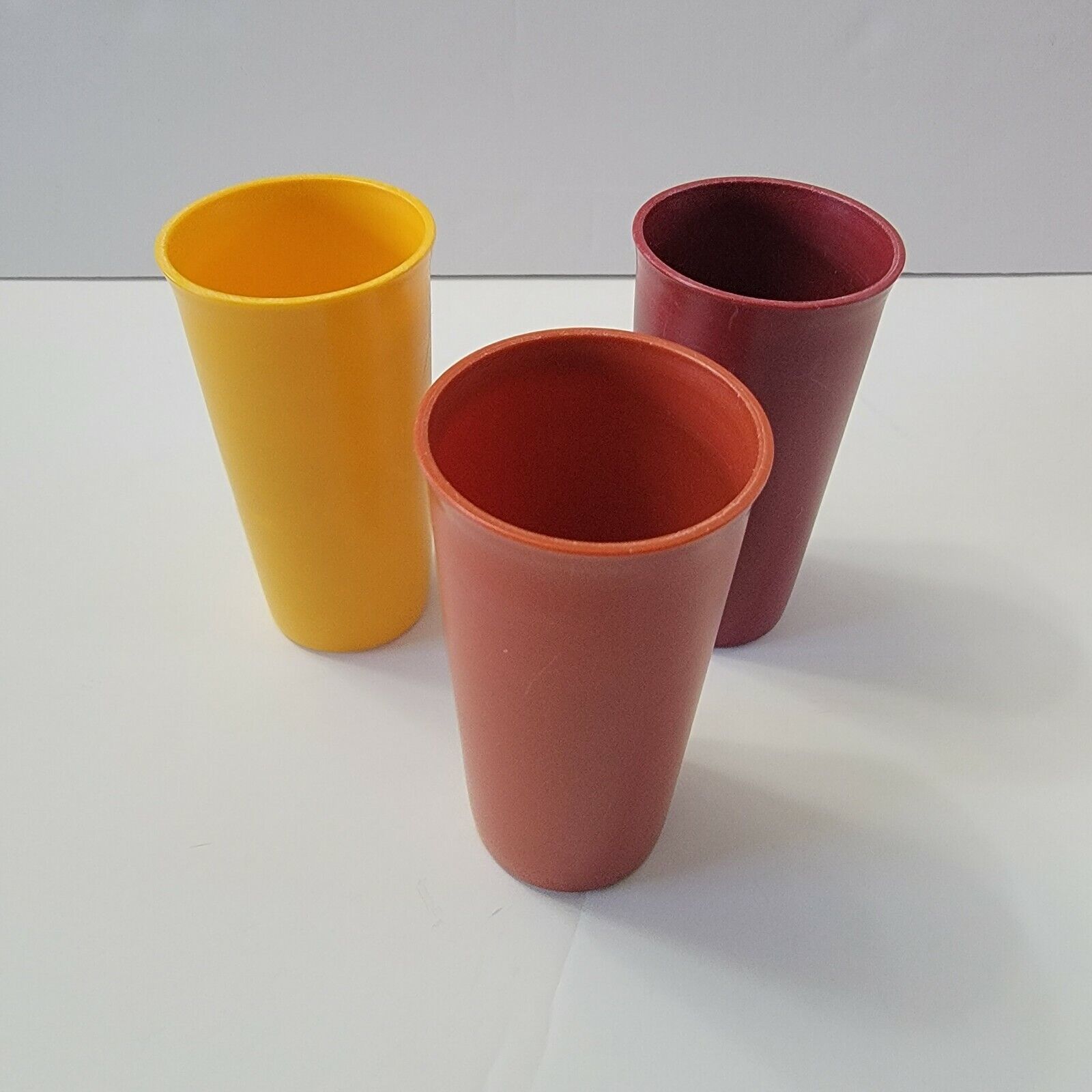 Primary image for Set of 3 Vintage Tupperware 9oz Tumbler Cups 116 Orange Red Yellow