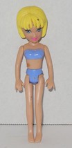 Polly Pocket Poseable Figure Toy Blonde Purple - $187.38 MXN