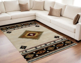 5&#39; X 8&#39; Ivory and Black Southwestern Hand Tufted Non Skid Area Rug - $429.61