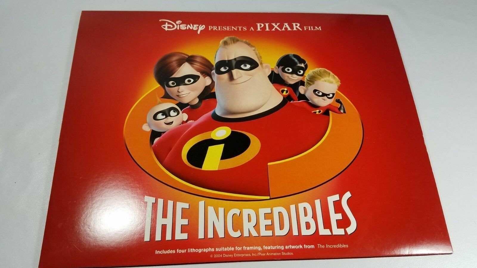 disney incredibles lithographs 2004, 3 of them with folder - £4.68 GBP