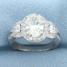 Diamond Halo Ring in 14k White Gold - £10,960.32 GBP