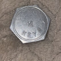 K Keys good for 50 cents in trade token - $1.97