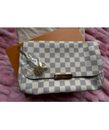 Authenticity Guarantee

Louis Vuitton Damier Azur Favorite Pochette  NEW  Har... - $1,444.41