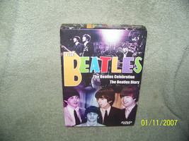 boxed set  music  dvd {on the beatles} + small 3x5 b&amp;w photo of the beatles } - £15.57 GBP