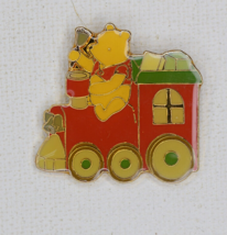 Disney classic Winnie the Pooh On Christmas Train Ringing A Bell Pin#6639 - £15.91 GBP