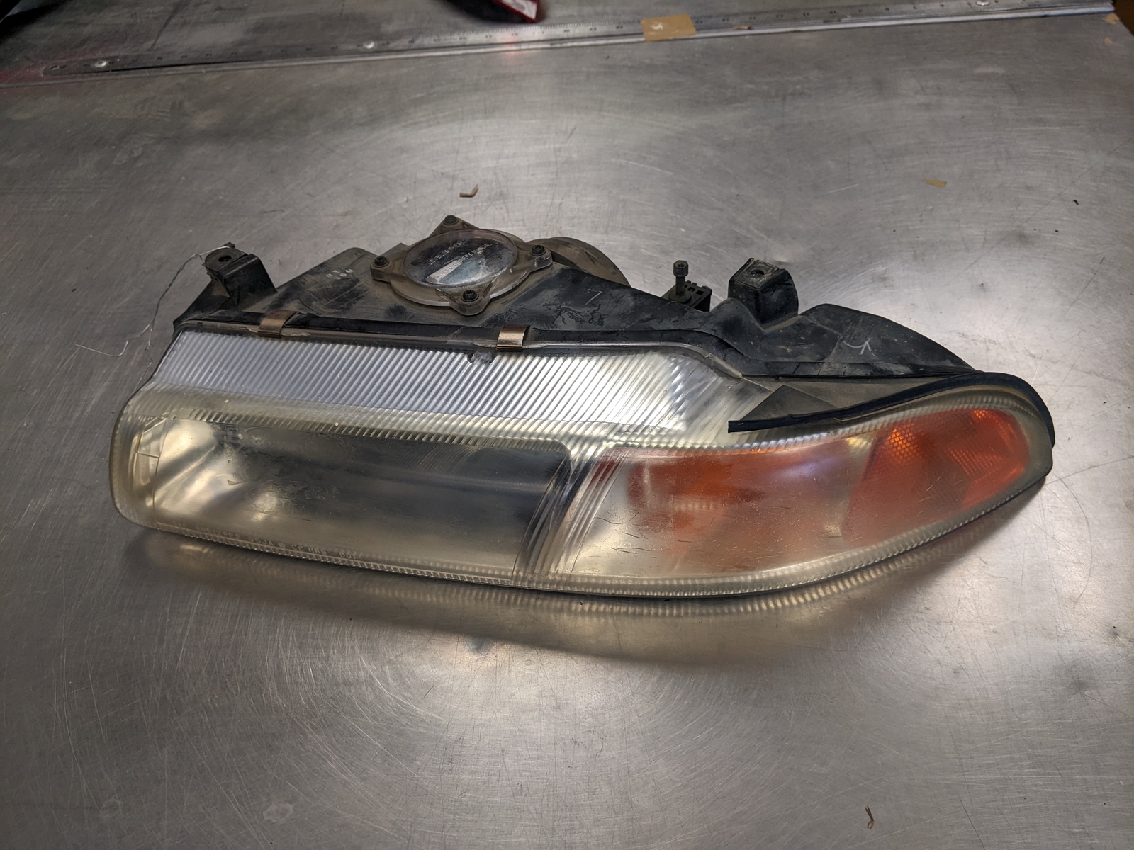 Primary image for Driver Left Headlight Assembly From 1998 Dodge Stratus  2.4