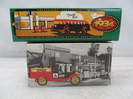 2 Die-Cast Truck Banks ERTL 1934 Texaco Doodlebug & Speed Cast 1916 Studebaker - $19.80