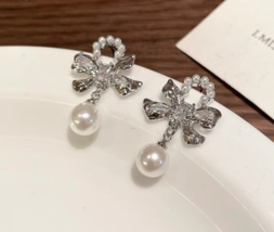 New Korean high-grade bow pearl earrings female light luxury temperament... - £15.56 GBP