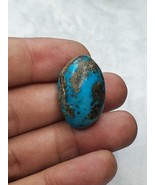 Un vero turchese naturale di forma ovale con cabochon a matrice di pirit... - $1,595.24 MXN