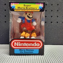 1988 Nintendo Super Mario Brothers Trophy Figure: Mario Stomps The Goombas - $79.19