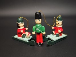 Vintage Lot of 3 Wooden Toy Soldiers Sleds Christmas Ornaments Hand Painted - $463.25 MXN