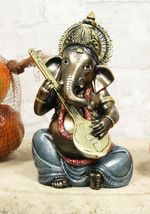 Ebros Celebration of Life and Arts Lord Ganesha Playing Instrument Statu... - $21.99