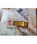 Gold bangle.  - $184.10 MXN