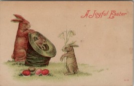 Easter Greetings Baby Rabbit in a Hat Colored Eggs c1910 Postcard U15 - £4.65 GBP