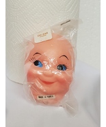 Vintage rubber blue eyed doll face - $6.50