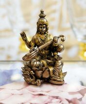 Ebros Vastu Hindu Goddess Saraswati Seated On Lotus Playing Veena Guitar... - $15.99