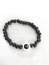 8 BALL DISC CERAMIC BEAD ON BLACK PORCELAIN BEADS STRETCH BRACELET 7 - 8&quot; - $110.27 MXN