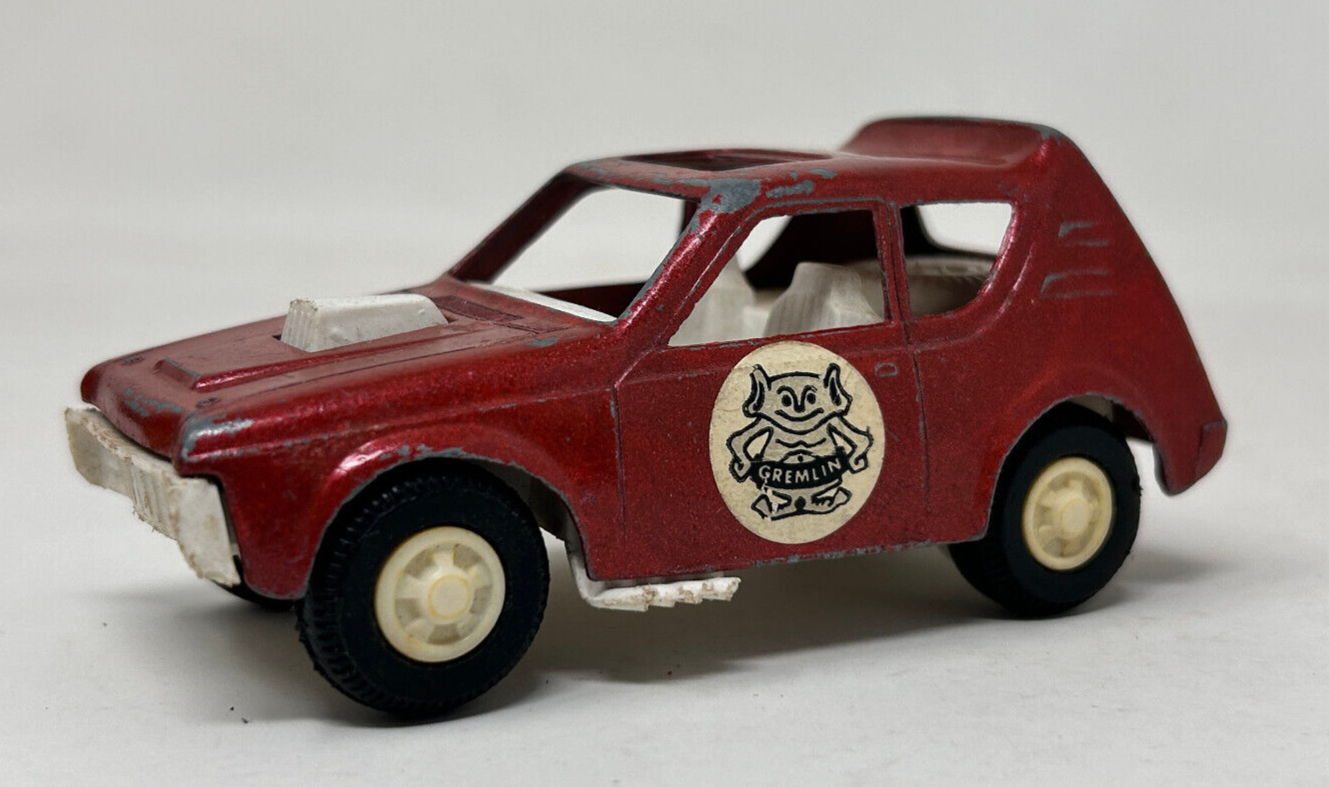 Primary image for Vtg Tootsietoy Diecast Plastic Funny Looking Red AMC Gremlin Dorky Car Sun Roof