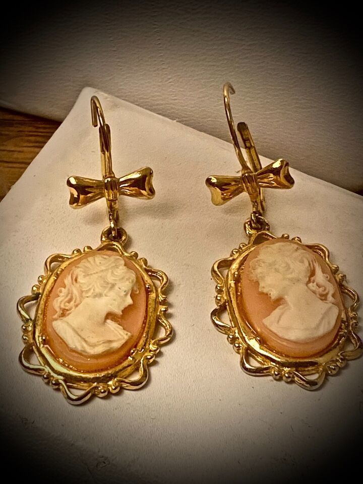 Light Coral with Bone Colored Cameos, gold tone Dangle Earrings - $15.00
