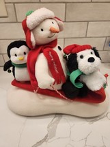 Hallmark 2007 Jingle Pals Snowman Sleigh Ride Musical Animated Sled Penguin Dog. - $22.00