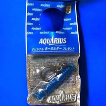 Rare AQUARIUS x 7-Eleven Promotional Keychain – Spring Stretch Design – ... - $16.50