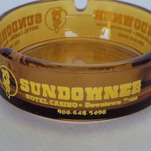 Vintage Reno Nevada Ashtray Sundowner Hotel Casino Amber Glass Cigarette... - $10.84 CAD