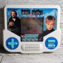 Home Alone 2 Tiger LCD Electronic Handheld Video Game WORKS!  - £19.35 GBP