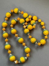 Vintage Long Sunny Yellow w Green Metal End Cap &amp; Iridescent Plastic Bead Neckla - £9.02 GBP