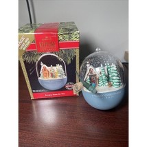 VTG Hallmark Light and Motion Bringing home the tree 1991 Plug In Tree O... - $28.00