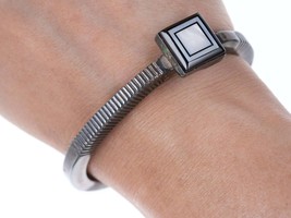 Ronnie Willie (Navajo) Heavy stamped sterling bracelet with jet and shell inlay - $292.05