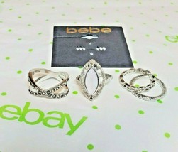 BEBE Women&#39;s Silver Tone Bands W White Fashion Ring Set 4 Pieces Size 6.75 New - £12.08 GBP