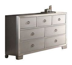 57" Platinum Solid and Manufactured Wood Seven Drawer Triple Dresser - $16,299.83 MXN