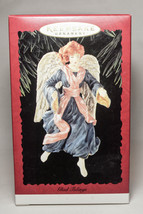 Hallmark: Glad Tidings Angel - 1996 Classic Keepsake Ornament - $12.66