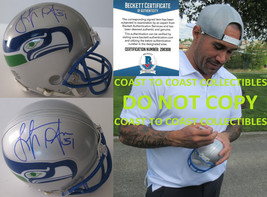 Lofa Tatupu autographed Seattle Seahawks mini football helmet COA proof ... - £87.04 GBP