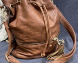 Call It Spring Drawstrung Bucket Handbag Brown Tassels Zippers - $18.81