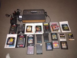 Atari 2600 4 SWITCH with joysticks, adapter, 20 GAMES ALL TESTED TO WORK - $168.29