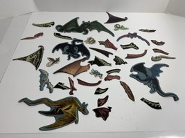Dragon Magnets Lot of 36 parts and pieces and complete Dragons - $9.69
