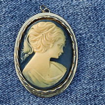 Vintage Large White Plastic Cameo Gold Tone Pin Brooch Blue Background - £8.50 GBP