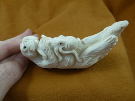ott-w8 little Otter with octopus of shed ANTLER figurine Bali detailed carving - £132.11 GBP
