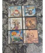 lot 6 empty cases Nintendo DS Clone Wars Indiana Jones Phineas Tangled - $21.62 CAD