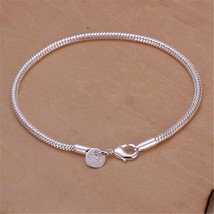 Silver color chain exquisite twisted bracelet fashion charm chain women men soli - £9.19 GBP