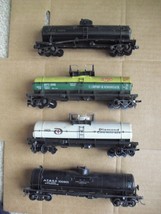 Lot of 4 Vintage 1970s HO Scale Weathered Tank Cars Dupont ATSF UTLX One Diecast - £27.18 GBP