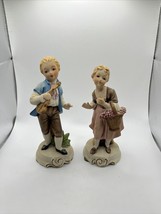 2 Vintage Porcelain Figurines Girl w/ Flower Basket &amp; Boy with VIOLIN SEE PHOTOS - $17.75