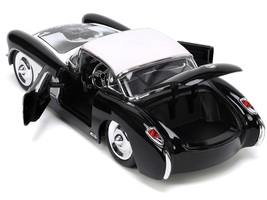 1957 Chevrolet Corvette Black with White Top and Wolfman Diecast Figure &quot;Univers - £40.49 GBP