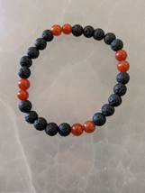 Carnelian and black lava rock  6mm. bead stretch bracelet size 6.5in. - $18.00