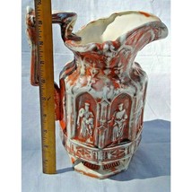 Vintage Embossed Catholic Saints Water Pitcher Religious Ceramic Orange/... - $39.95